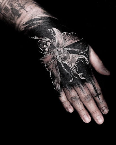 black tattoo covered