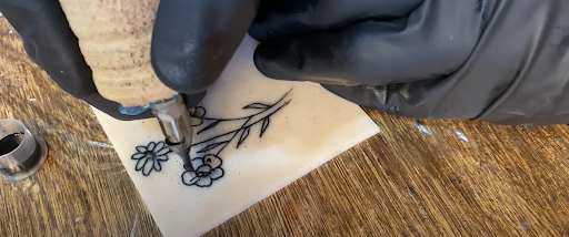 Fine line flowe tattoo