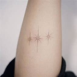 Fine line tiny tattoos of stars Fine line tiny tattoos of stars
