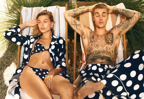 Justin and Hailey Bieber posing for a magazine with visible tattoos Justin and Hailey Bieber posing for a magazine with visible tattoos