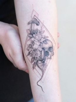 Skull and flowers fine line tattoo Skull and flowers fine line tattoo in black ink