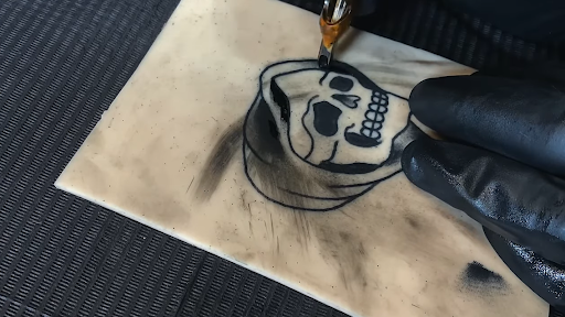 Skull tattoo drawinf on fake skin