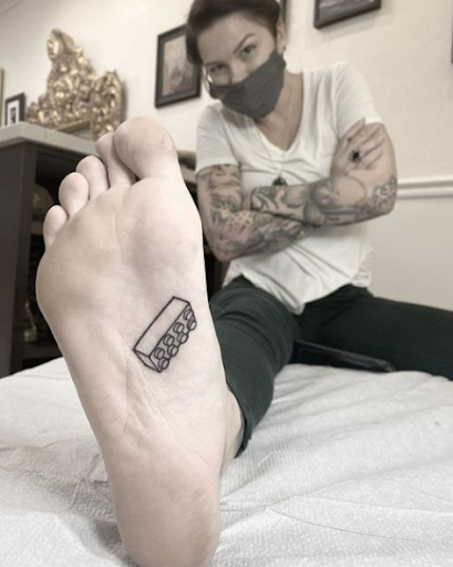 tattoo on thin skin of foot arch