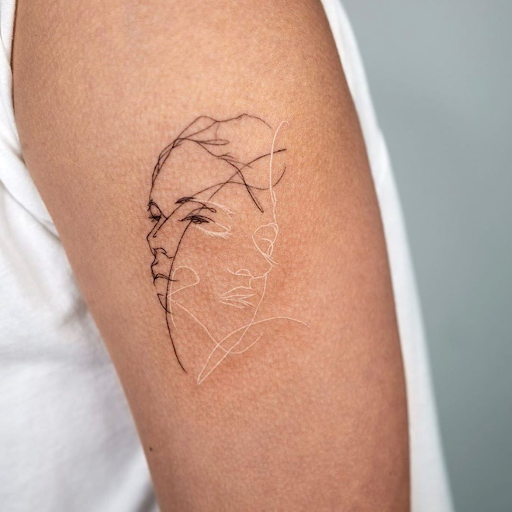 Tattoo with both white and black ink