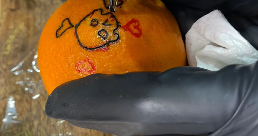Tattooing an Orange