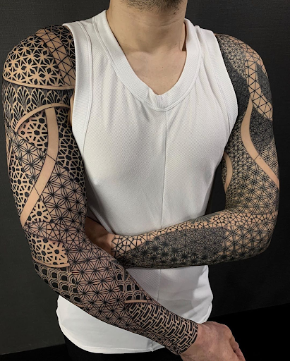 tattoos covering entire arm