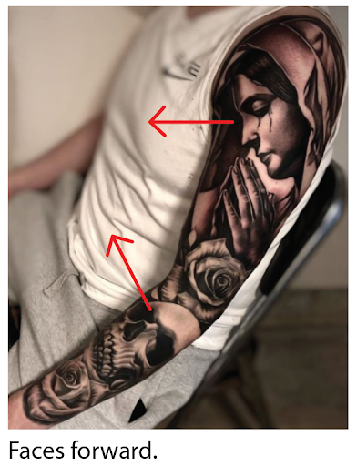 upper arm tattoo of a woman upper arm tattoo of a woman