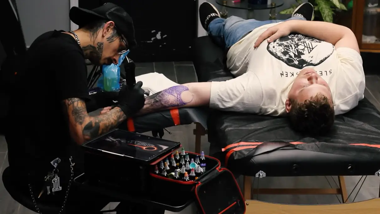 Brandon Tattooing Hand